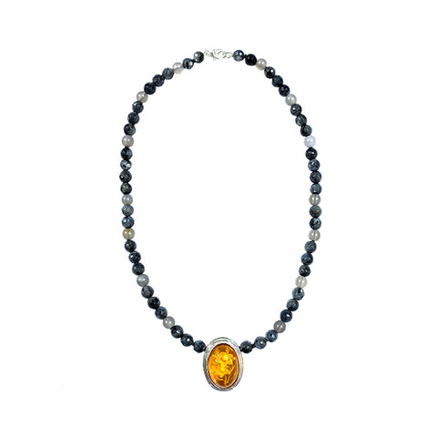 Necklace with central amber